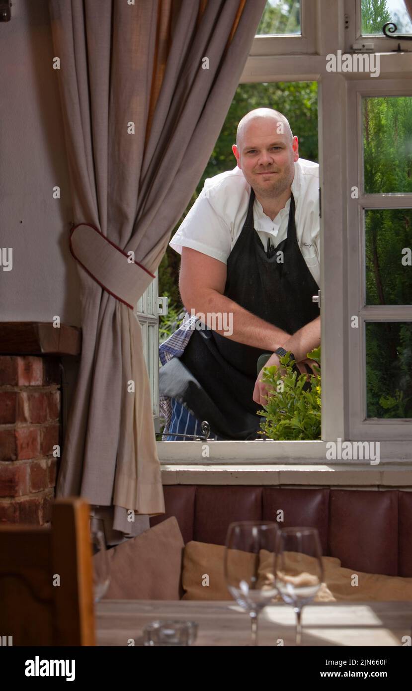 Tom Kerridge in the dining room at the Hand & Flowers, his 2 Michelin Star pub Stock Photo