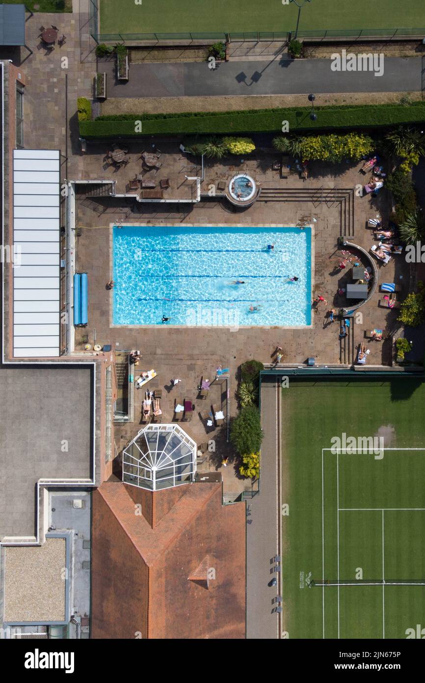 Edgbaston Priory Tennis Club, Birmingham, England, August 9th 2022. - Members of Birmingham's exclusive Edgbaston Priory Tennis Club enjoyed a swim in the outdoor pool today as temperatures rocketed back up as another heatwave hit the country. Pic by Credit: Sam Holiday/Alamy Live News Stock Photo
