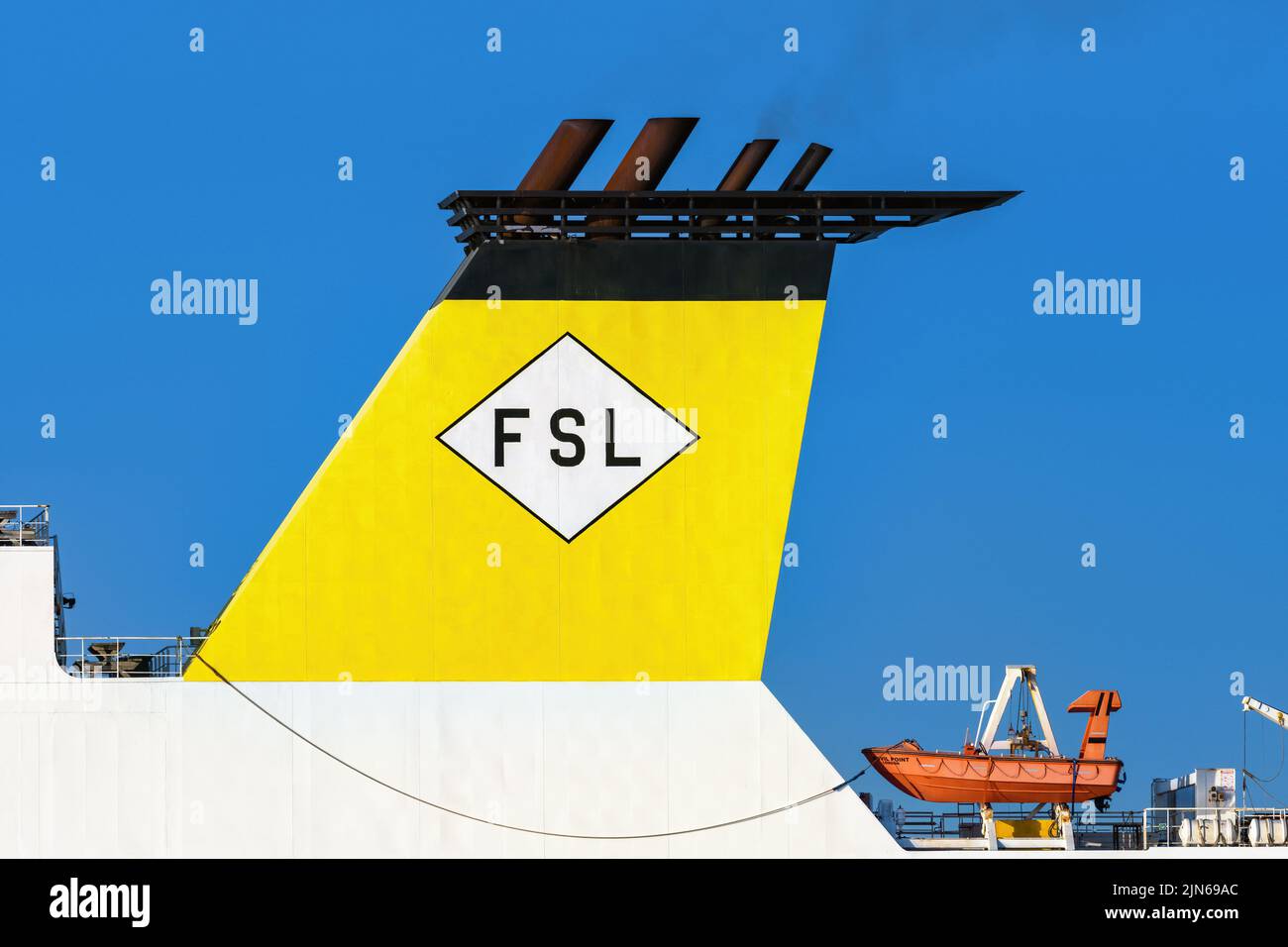 View of the funnel logo of Foreland Shipping Limited on the Point class RO-RO Anvil Point - May 2022. Stock Photo