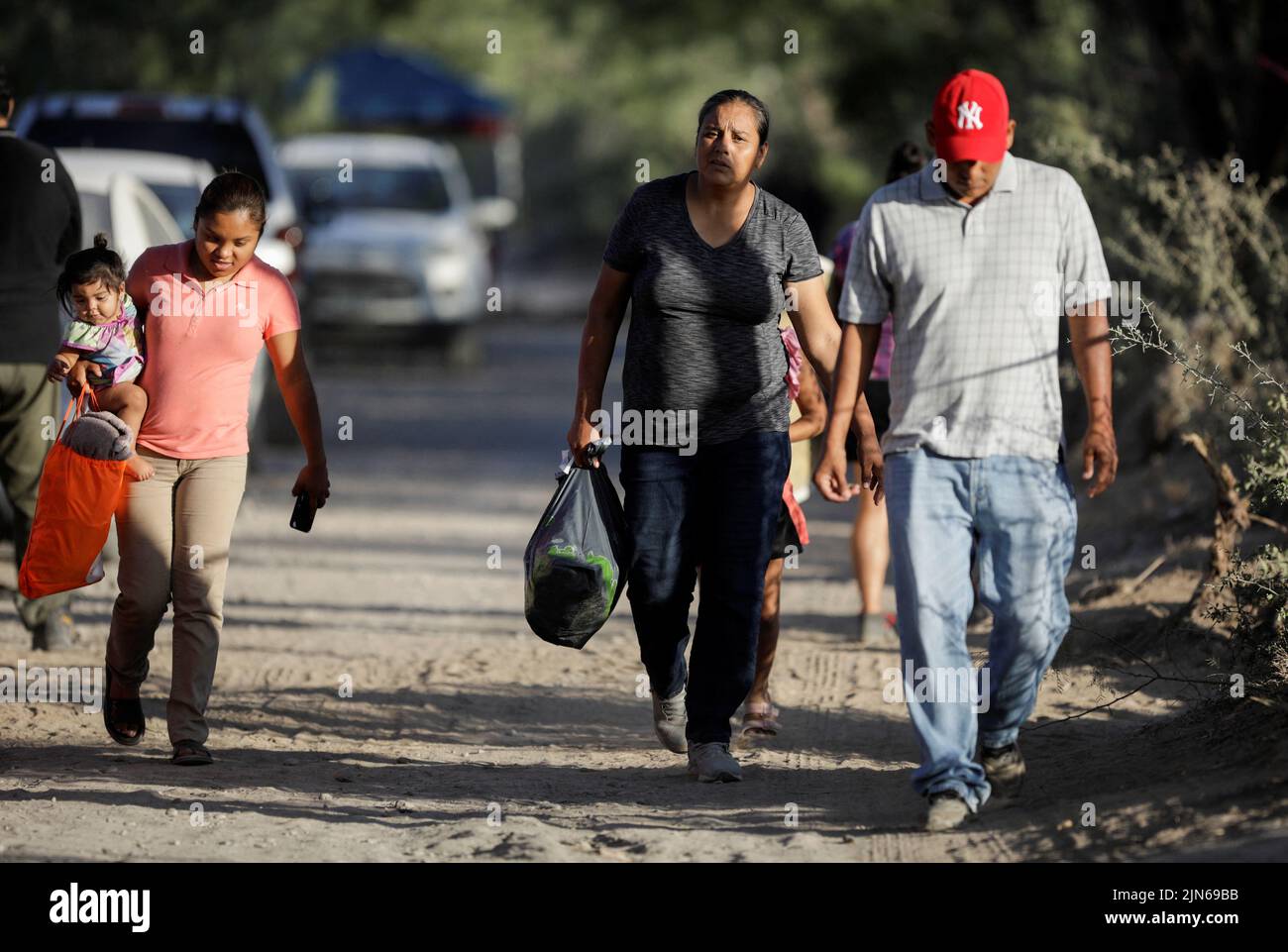 Relatives of miners arrive to the waiting area for news about their loved ones outside the facilities of a coal mine where a mine shaft collapsed leaving miners trapped, in Sabinas, Coahuila state, Mexico, August 9, 2022. REUTERS/Luis Cortes Stock Photo