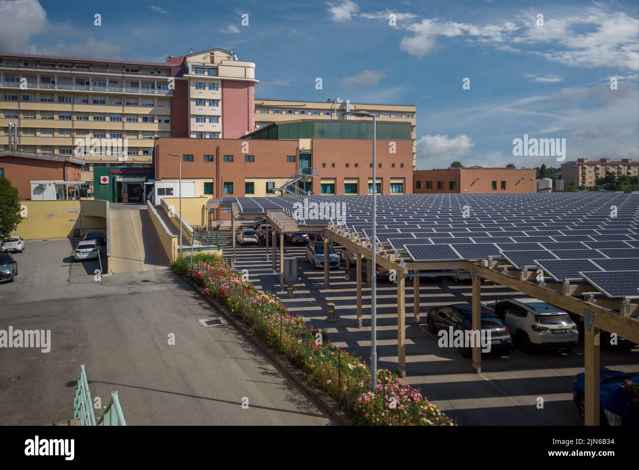 Savigliano, Cuneo, Italy - August 09, 2022: SS Annunziata Hospital ASL CN1. View of the hospital building with entrance of First Aid emergency and wit Stock Photo