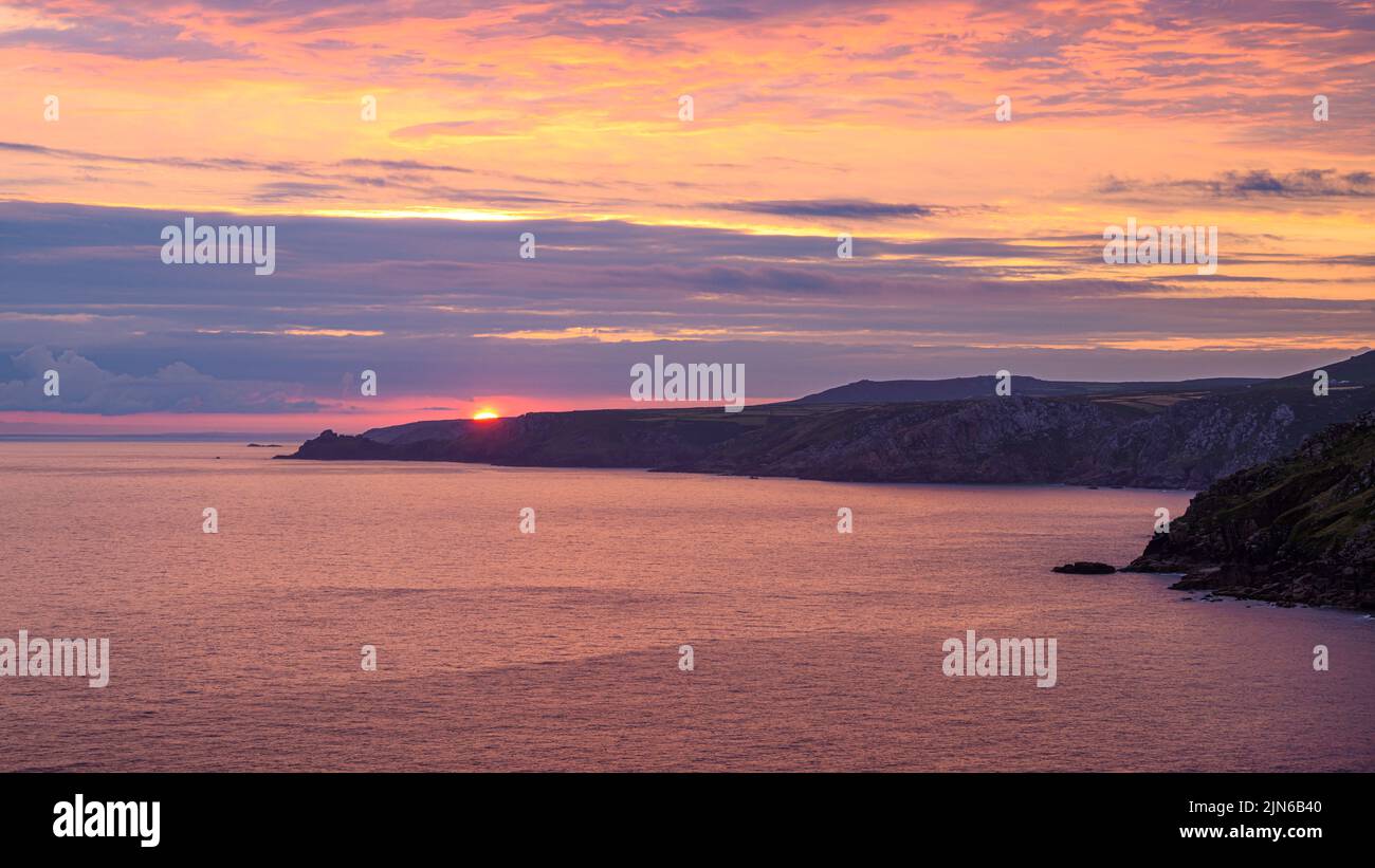 Sunset over the Cornish coast at Pendeen Stock Photo