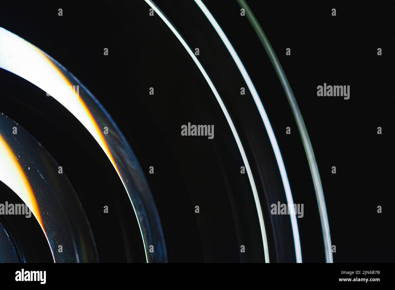 Light lines of round Fresnel lens, abstract photo background. It is a type of composite compact lens developed by the French physicist Augustin-Jean F Stock Photo