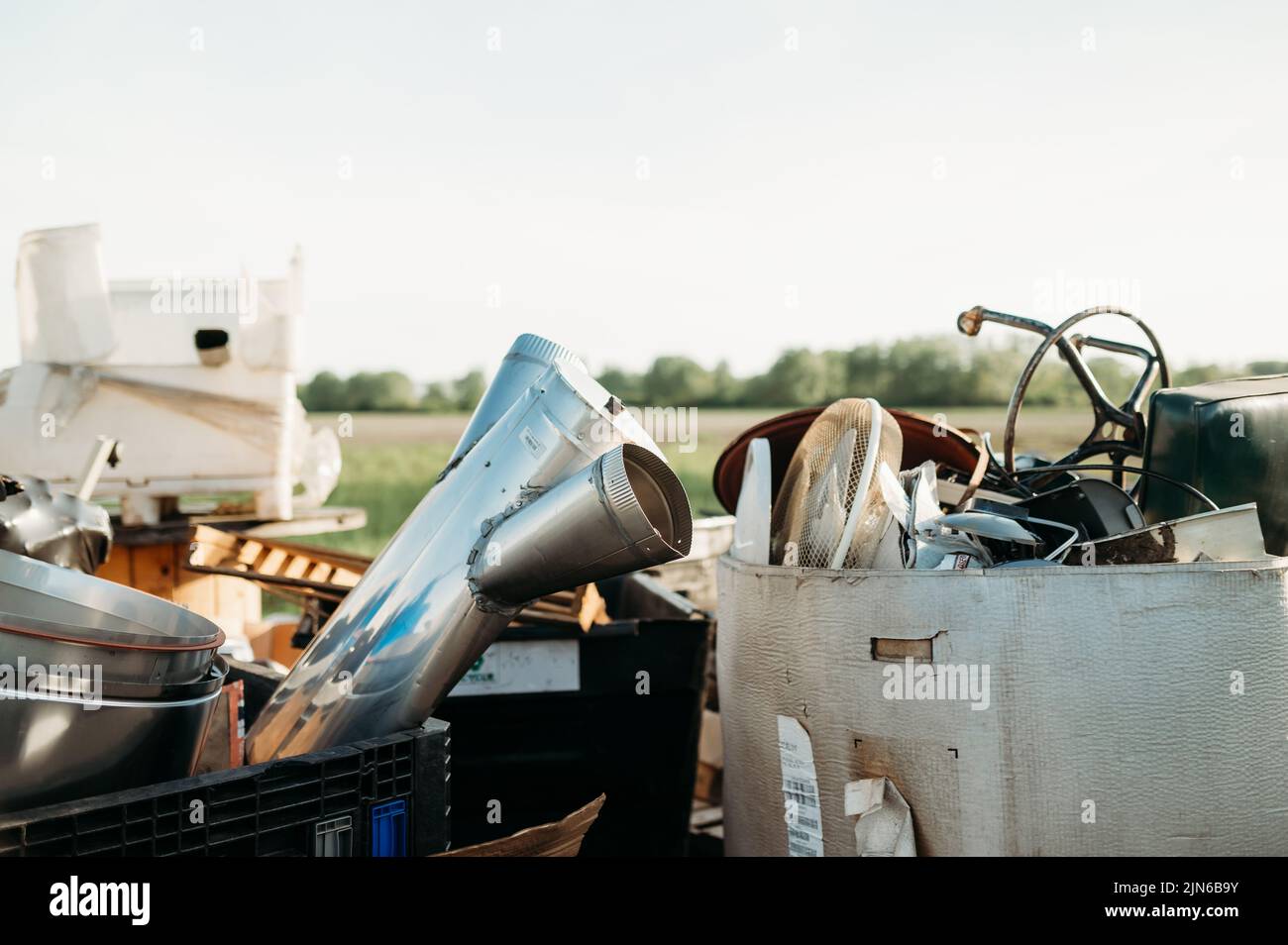 A collection of used household goods in the recycling center Stock