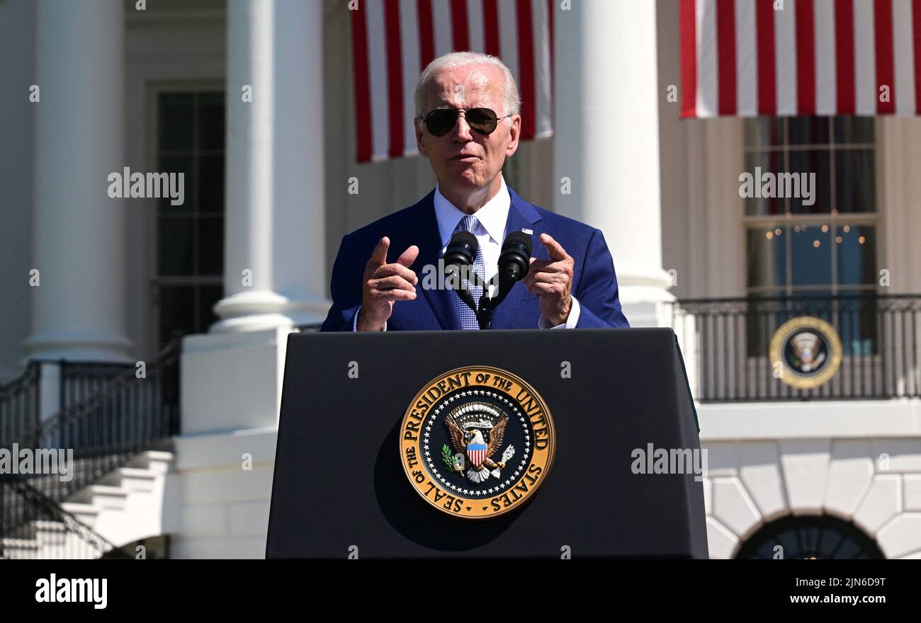 United States President Joe Biden delivers remarks and signs into law H.R. 4346, the CHIPS and Science Act of 2022 on the South Lawn of the White House in Washington, DC on Tuesday, August 9, 2022. The bill is intended to lower the cost of everyday goods, strengthen American manufacturing and innovation, and create good-paying jobs to bolster US economic and national security.Credit: Ron Sachs / Pool via CNP Stock Photo