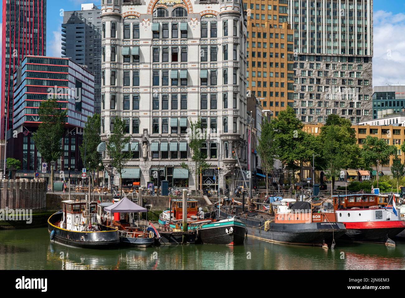 Rotterdam city centre, Oudehaven, historic harbour, historic ships, modern city backdrop, Netherlands, Stock Photo