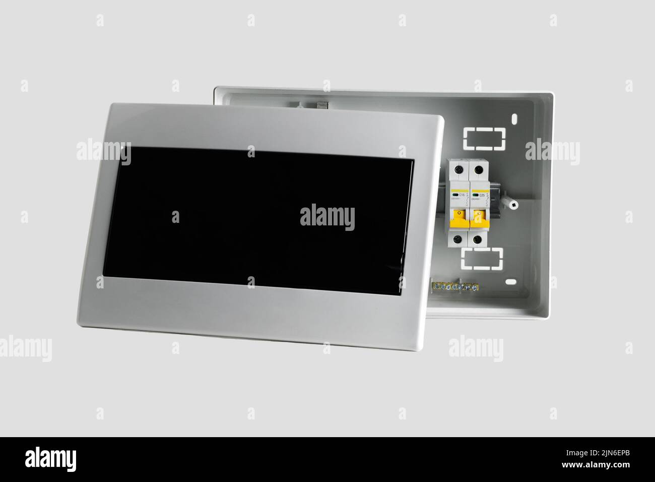 Plastic distribution board. Electrical board. Closeup. Isolated on