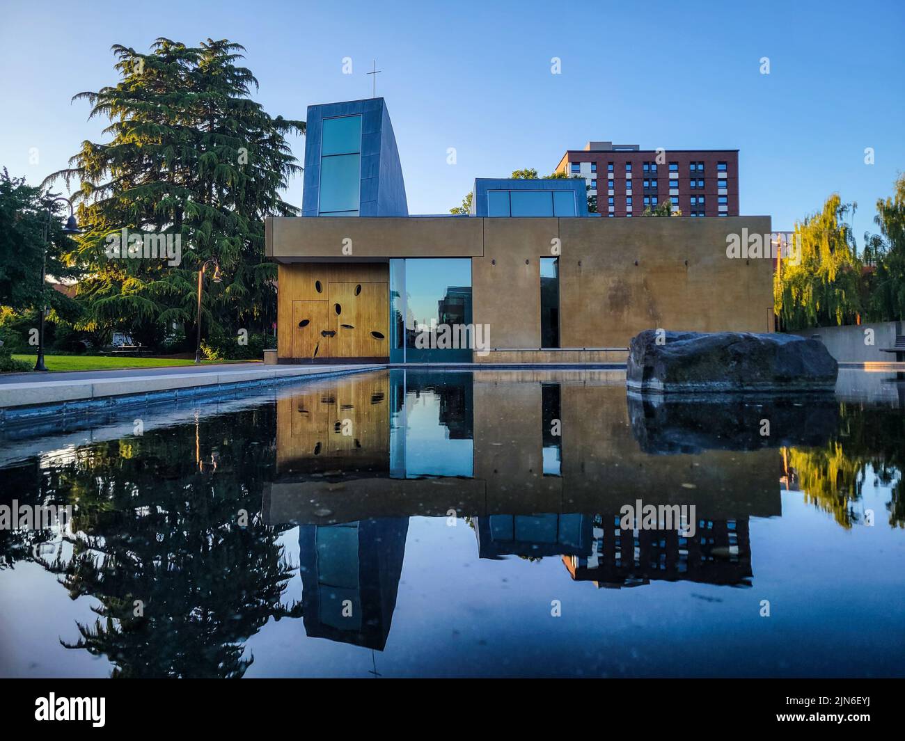 The Seattle University chapel reflected in a pool Stock Photo