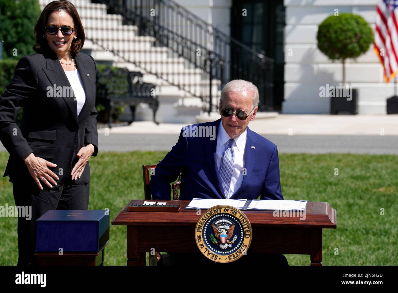 U.S. President Joe Biden next to Vice President Kamala Harris prepares to sign into law the CHIPS and Science Act during a ceremony on the South Lawn of the White House in Washington on August 9, 2022. Photo by Yuri Gripas/ABACAPRESS.COM Stock Photo