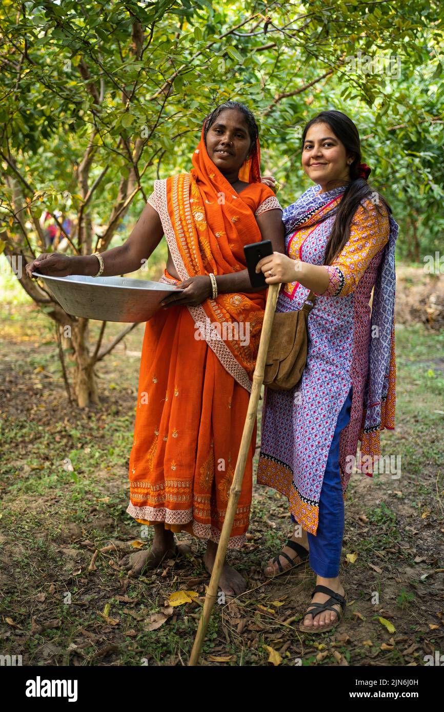 Beautiful Bengali, Indian woman smiling at the camera. Stock Photo