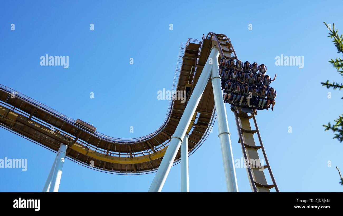 Young People screaming during a ride at Liseberg roller coaster 'Valkyia' Stock Photo