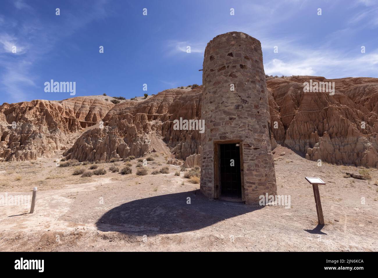 Civilian Conservation Corps Water Tower and Rock Formation in the desert Stock Photo