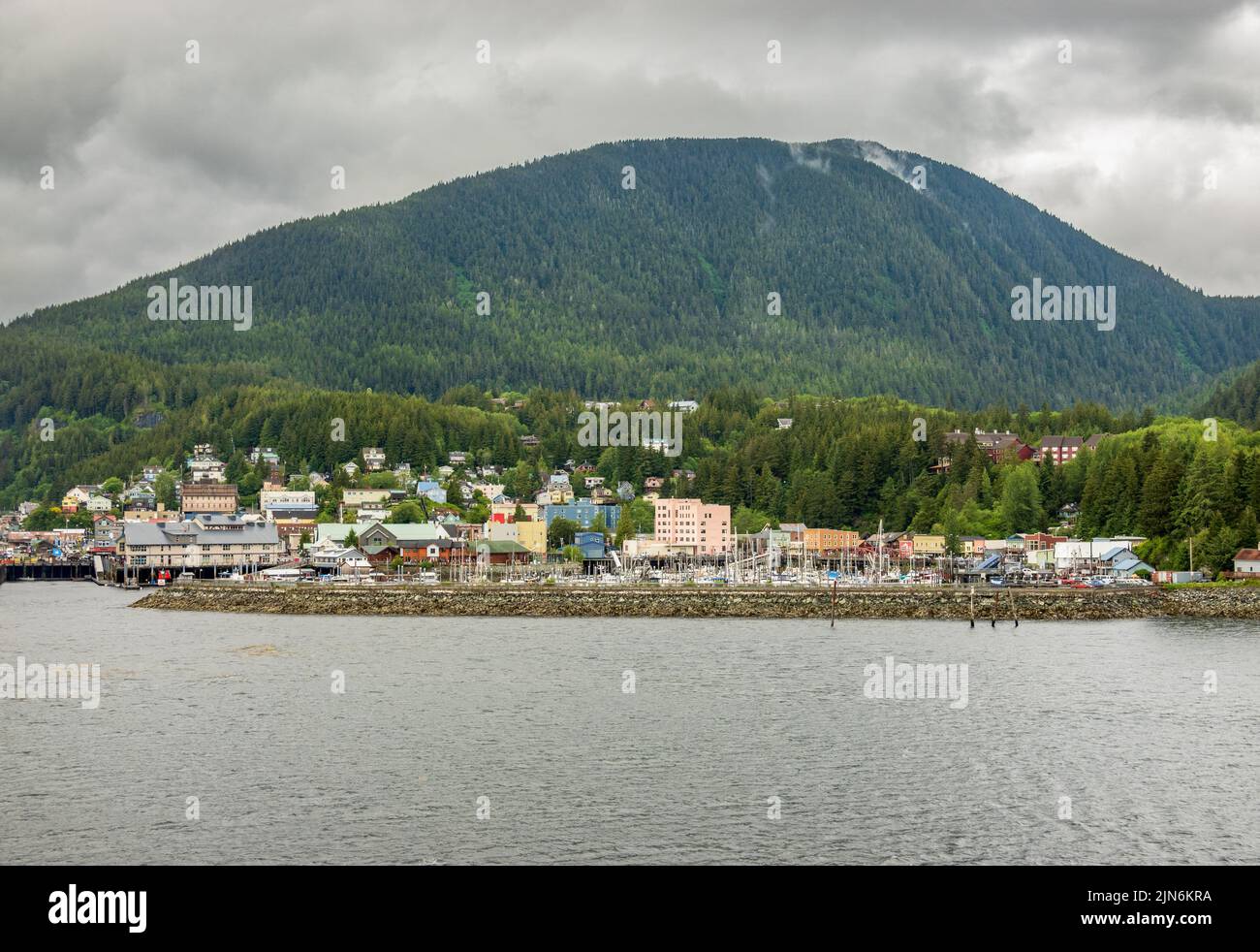 Departing from the harbor at Ketchikan Alaska on a typical rainy day Stock Photo