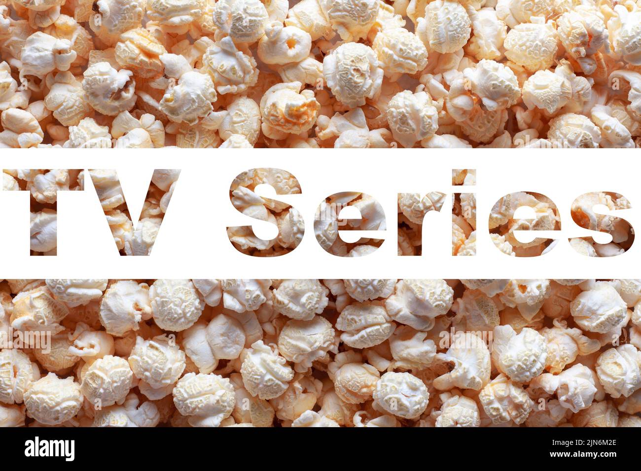 Popcorn texture background with inscription MOVIE. Word MOVIE on white ...