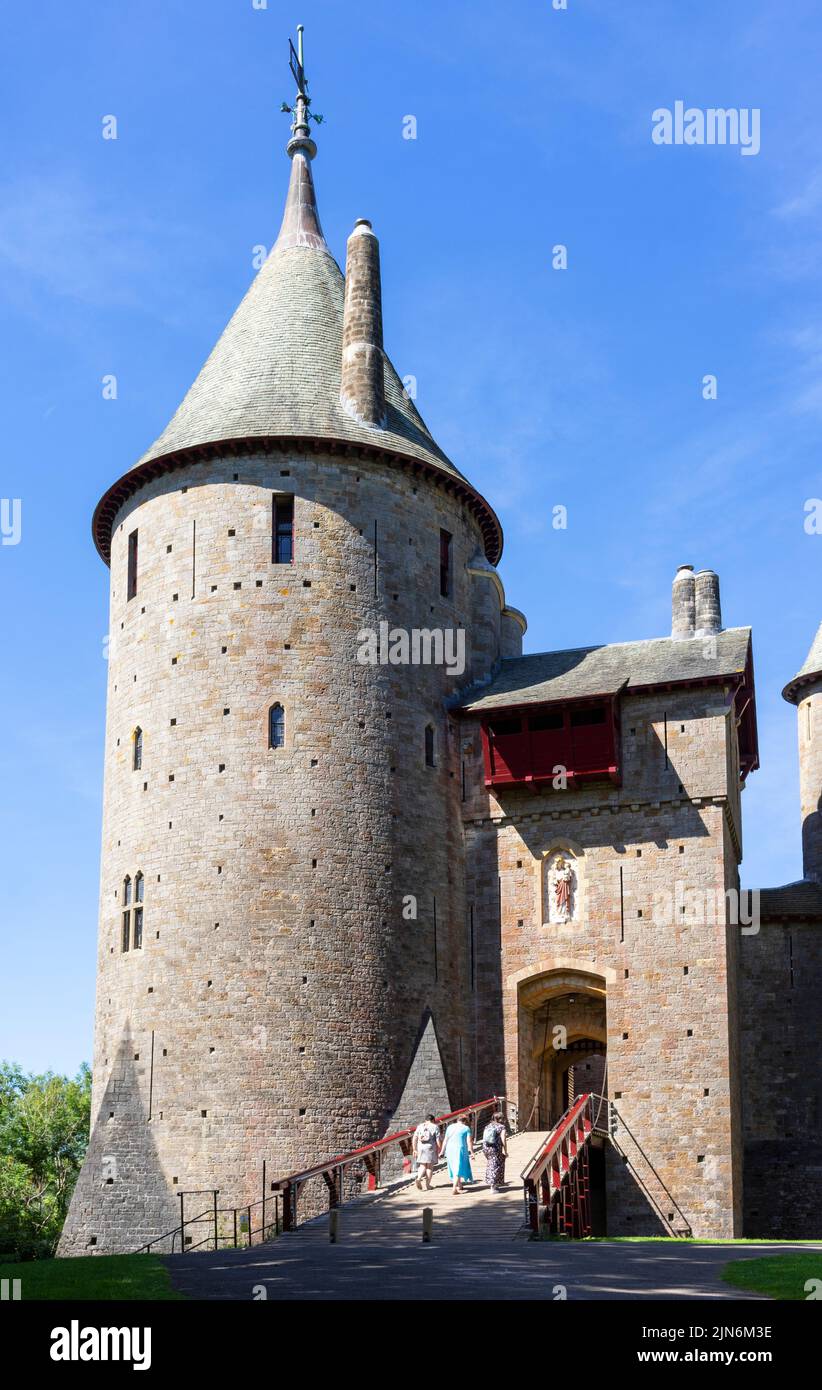 Thre women walking up the castle drawbridge to Castell Coch Castle Coch or Red Castle Tongwynlais Cardiff South Wales UK GB Europe Stock Photo