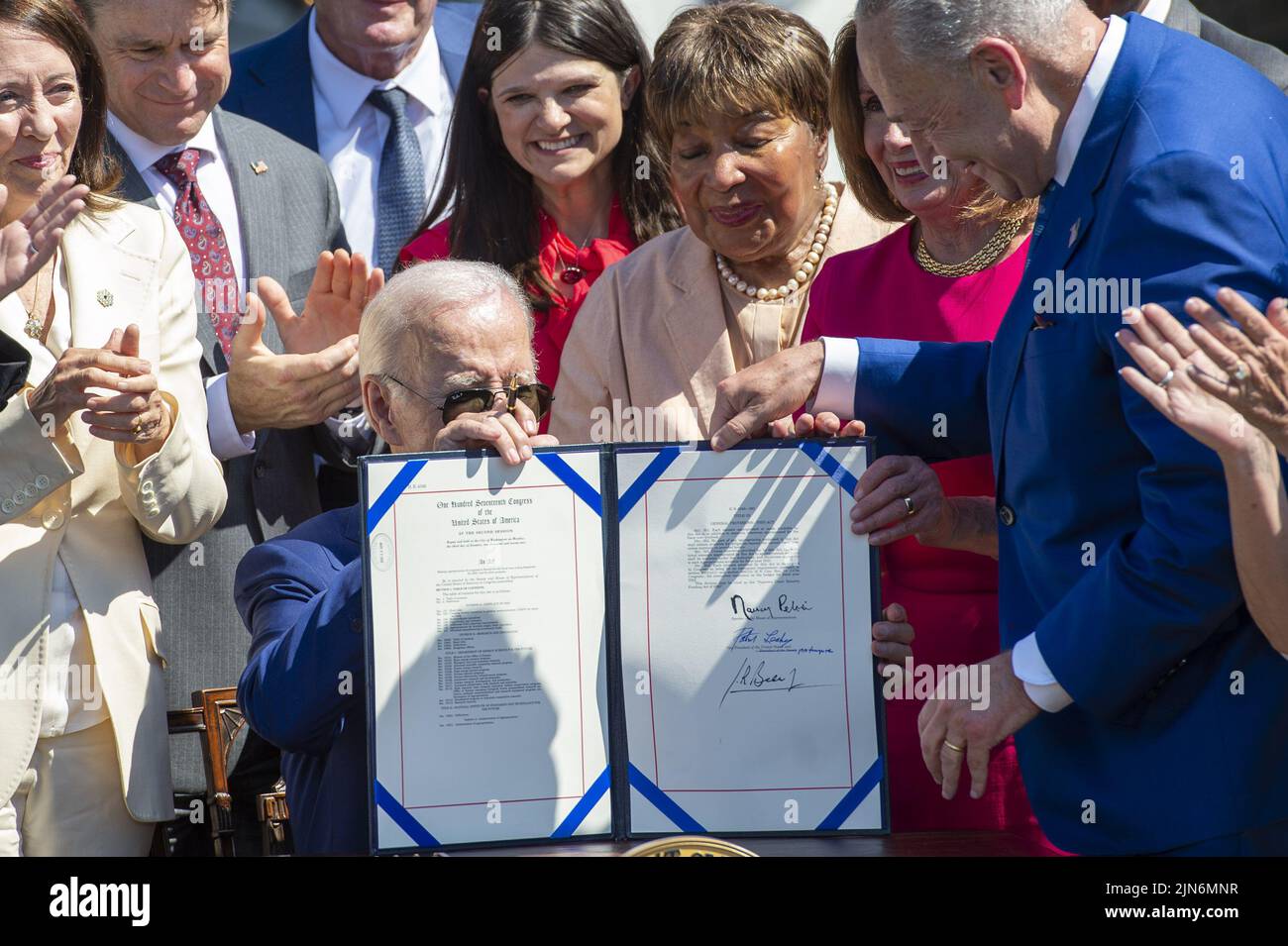 Washington, United States. 09th Aug, 2022. President Joe Biden holds a