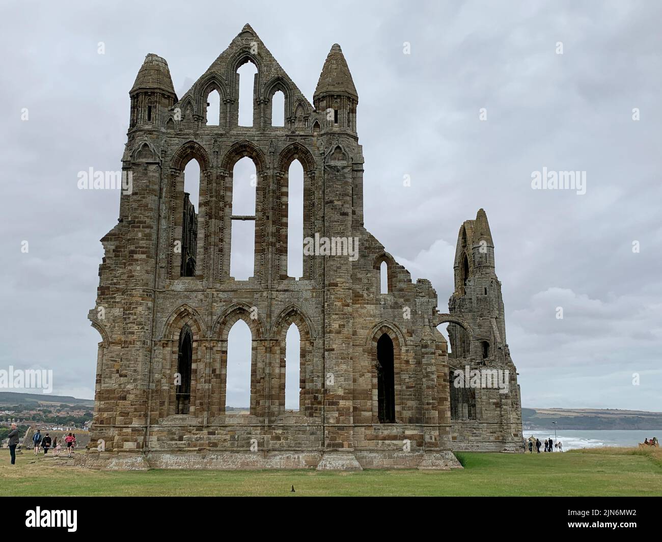Whitby Abbey FaÃ§ade with People on Overcast Day Stock Photo
