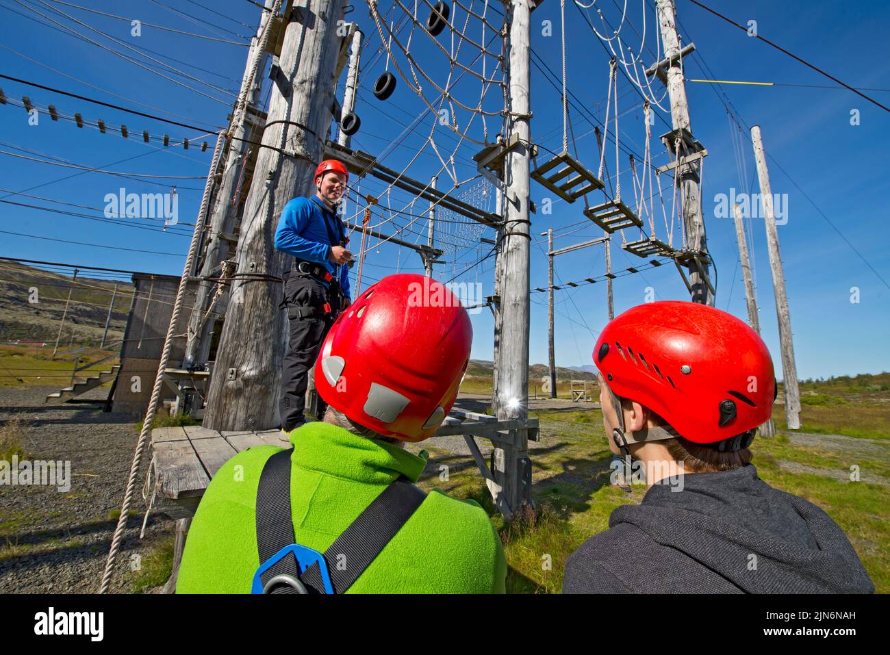 instructor at high rope access course in Iceland Stock Photo