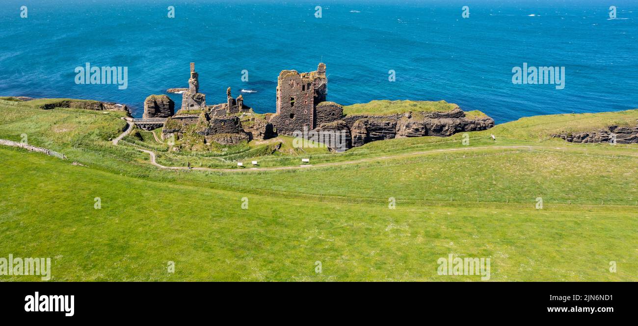 Wick, United Kingdom - 26 June, 2022: panorama drone view of the Caithness coast and the ruins of the historic Castle Sinclair Girnigoe Stock Photo