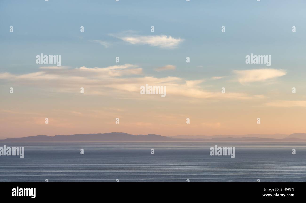 Panoramic View of Cloudscape during a colorful sunset or sunrise. Stock Photo