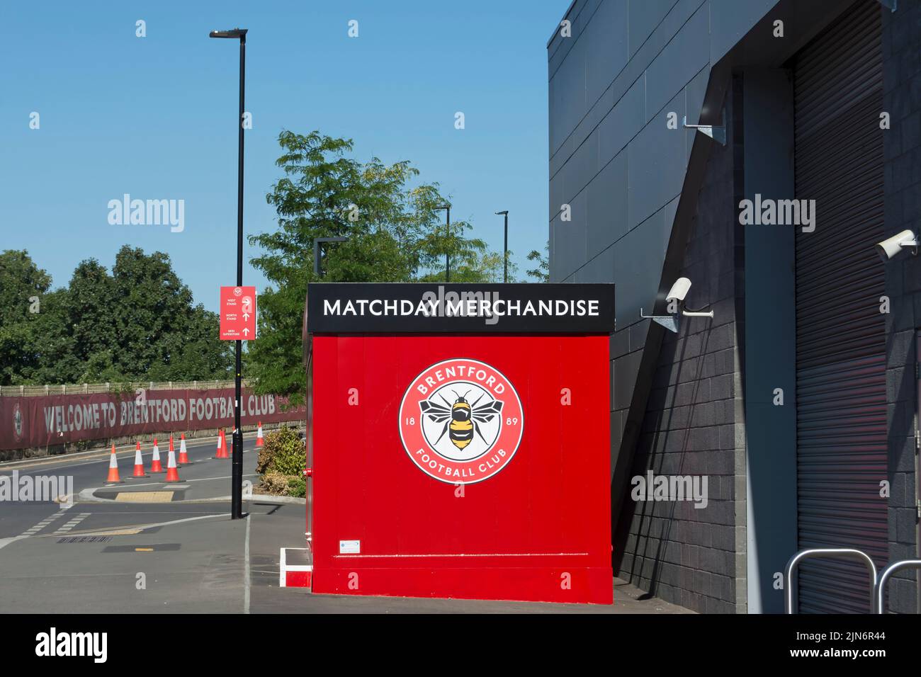 matchday merchandise kiosk outside the gtech community stadium, home of brentford fc, with welcome banner in background, brentford, london, england Stock Photo