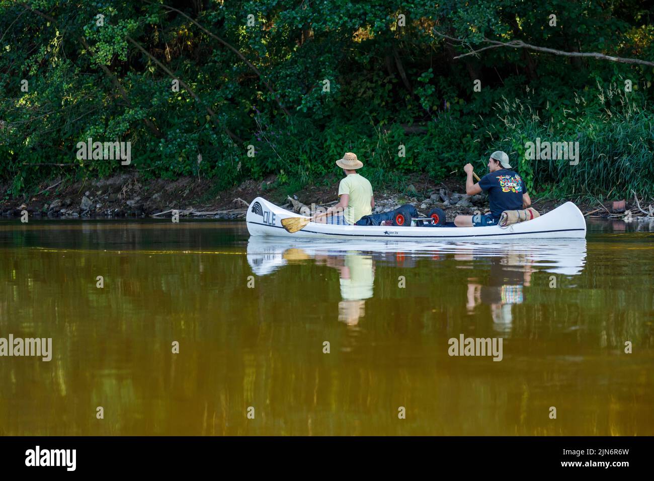 Canoeing and kayaking on a river Stock Photo