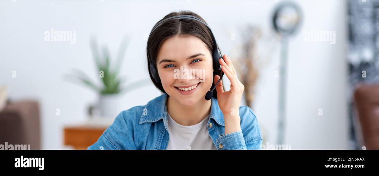 woman agent customer support services in headset online consultation Call center Smiling female customer support Stock Photo