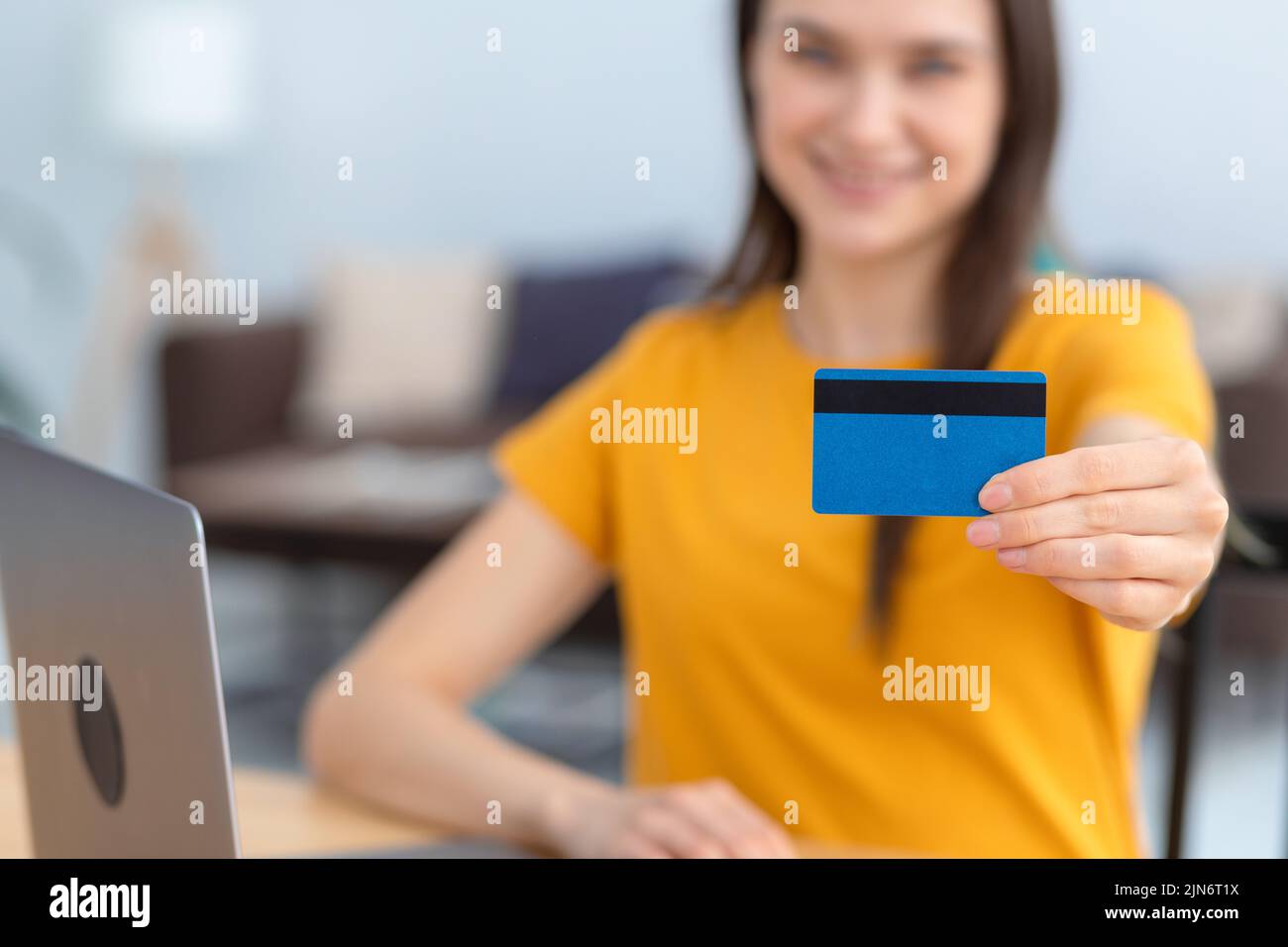 bank credit card in female hands Online shopping secure internet banking Stock Photo