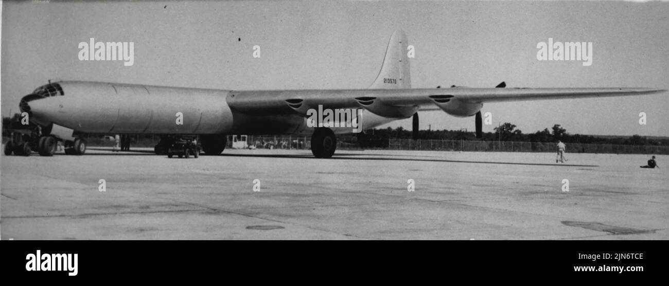 World's Largest Land-Based Bomber -- The world's largest land-based bomber, Consolidated Vultee XB-36, is being readied for its initial ground tests. The bomber is a pusher type Aircraft powered by six 3,000 horsepower Pratt & Whitney engines, has a wing spread of 230 feet, and a fuselage length of 163 feet. Initial test are scheduled for later in the summer, depending on the completion date of ground and taxi tests. June 21, 1946. (Photo by Associated Press Photo). Stock Photo