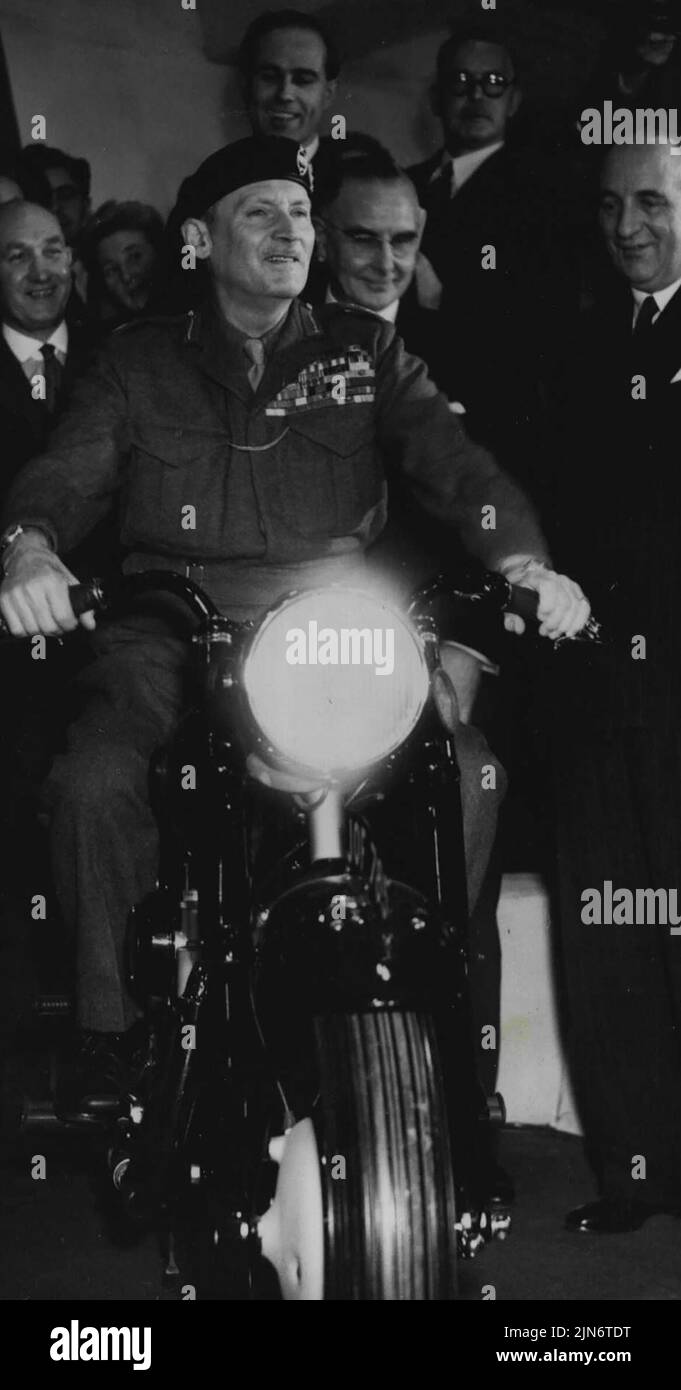 A Present For The Field Marshal ***** -- Field Marshal Montgomery of the ***** out his new motor-cycle after ***** presentation at Earl's Court, *****.A new 'Sunbeam' motor cycle was ***** to Field Marshal  Montgomery after ***** and Motor-Cycle show, in the ***** Earl's Court, London. November 18, 1948. (Photo by Sport & General Press Agency Limited). Stock Photo
