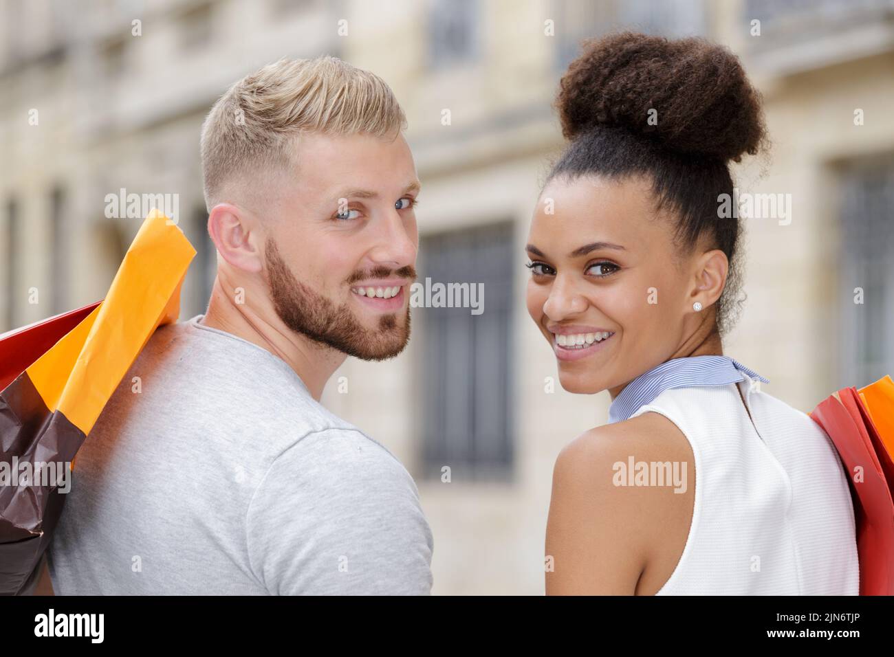 a couple with shopping bags Stock Photo