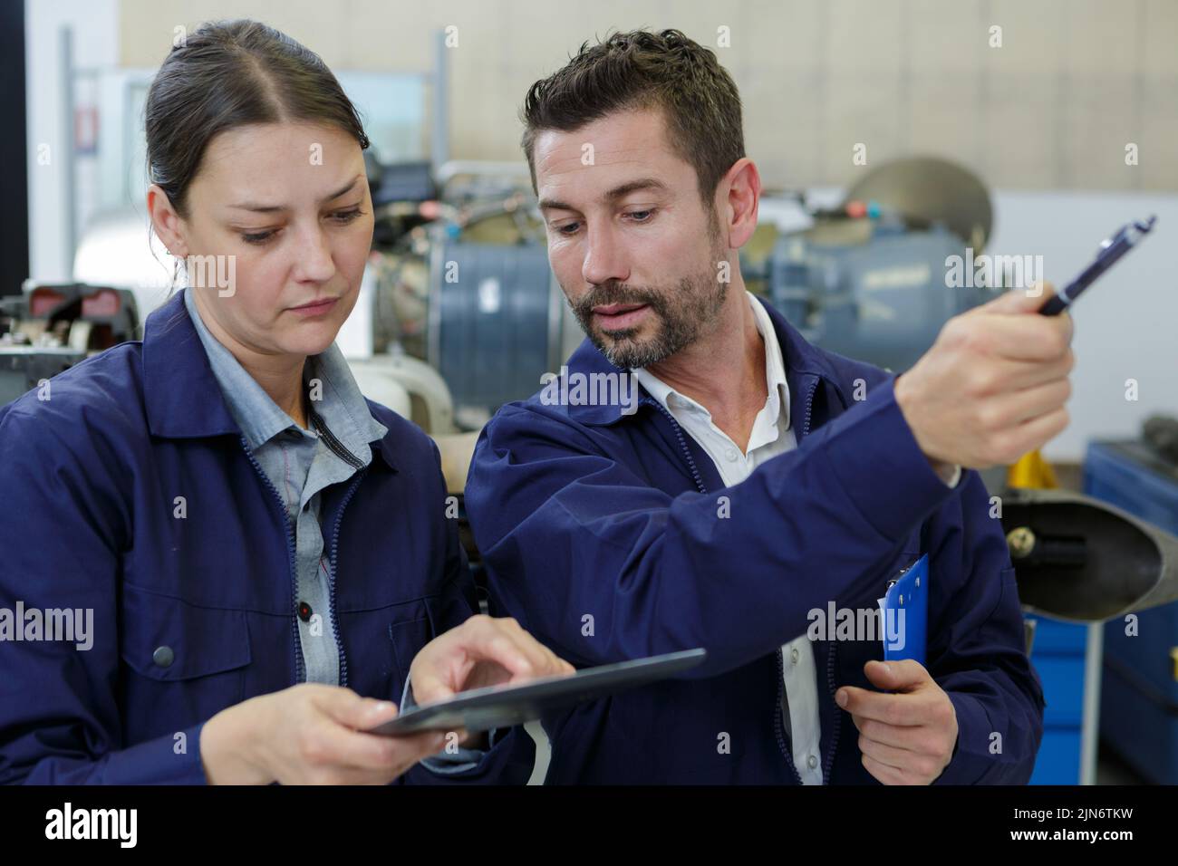 checking on production in factory Stock Photo
