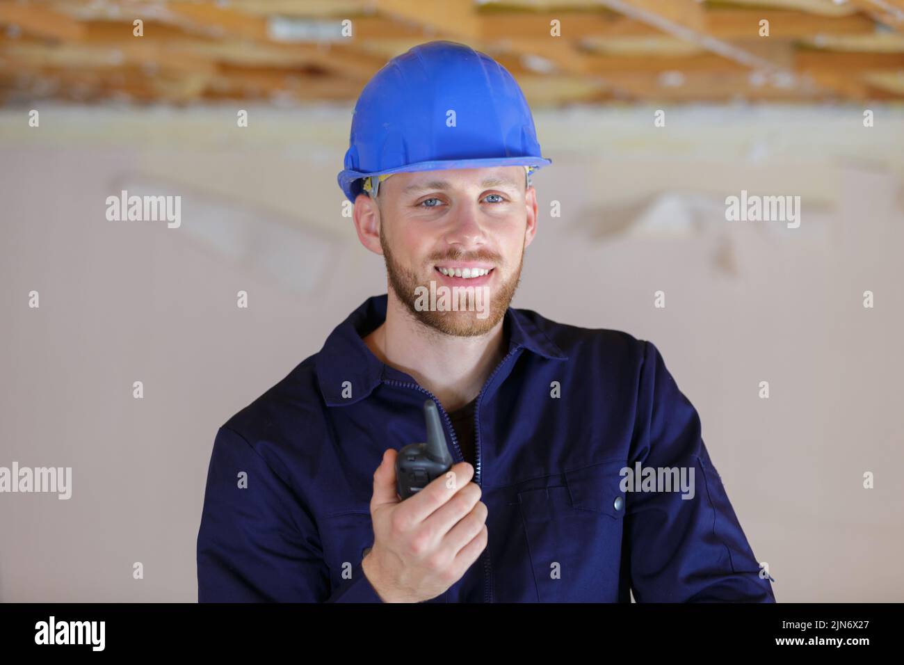 male worker with walkie talkie Stock Photo