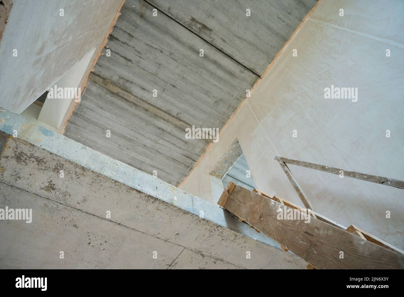 Photo of stairs to the second floor in unfinished house Stock Photo
