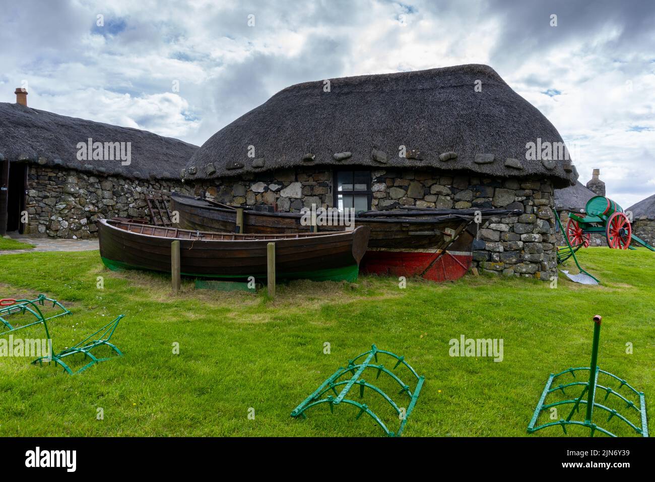 Kilmuir, United Kingdom - 1 July, 2022: the Skye Museum of Island Life in Kilmuir on the coast of the Isle of Skye with thatched crofter cottages and Stock Photo