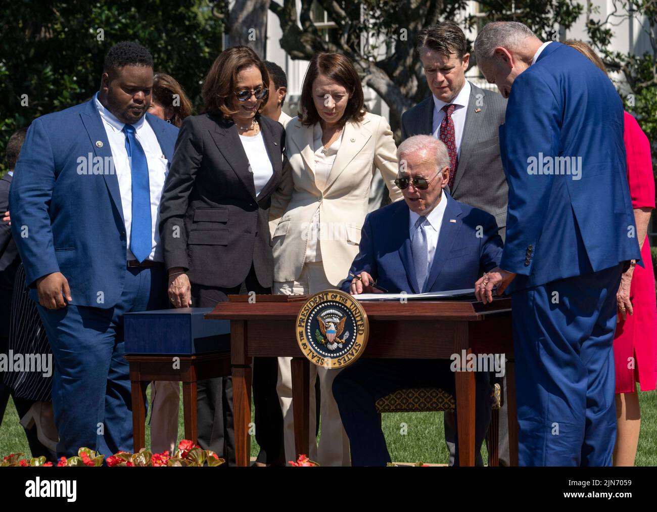 United States President Joe Biden signs into law H.R. 4346, the CHIPS