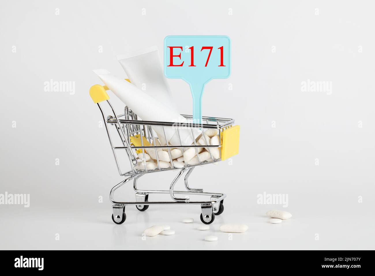 Titanium dioxide, E171, dangerous additive concept. gum, pills ...