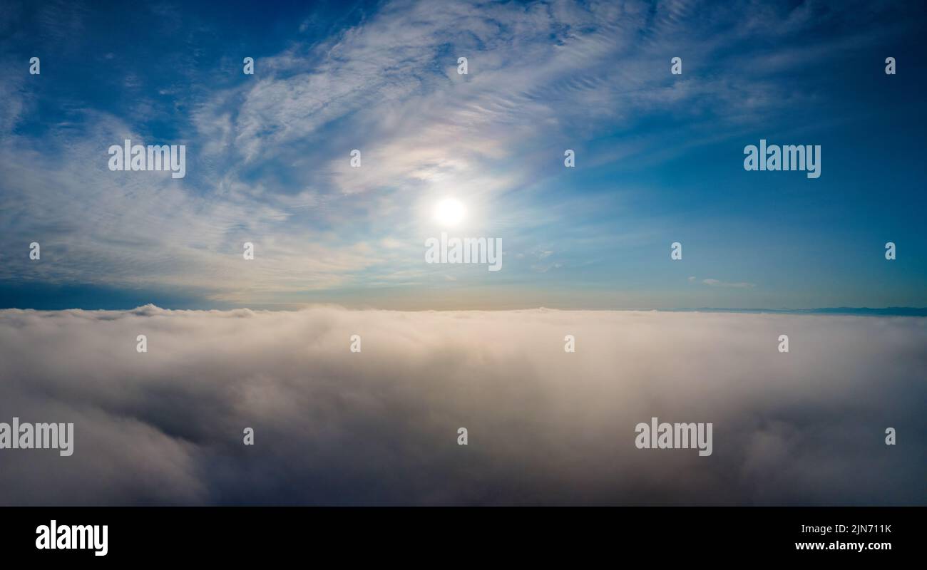 Aerial view from above of white puffy clouds in bright sunny day Stock ...
