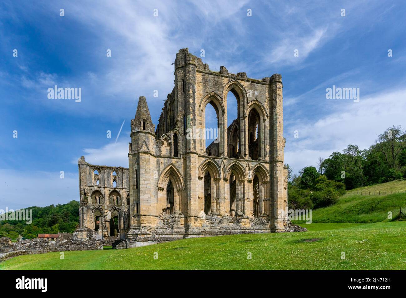 Rievaulx, United Kingdom - 17 June, 2022: view of the nave and church ruins in the historic Rievaulx Abbey in North Yorkshire Stock Photo