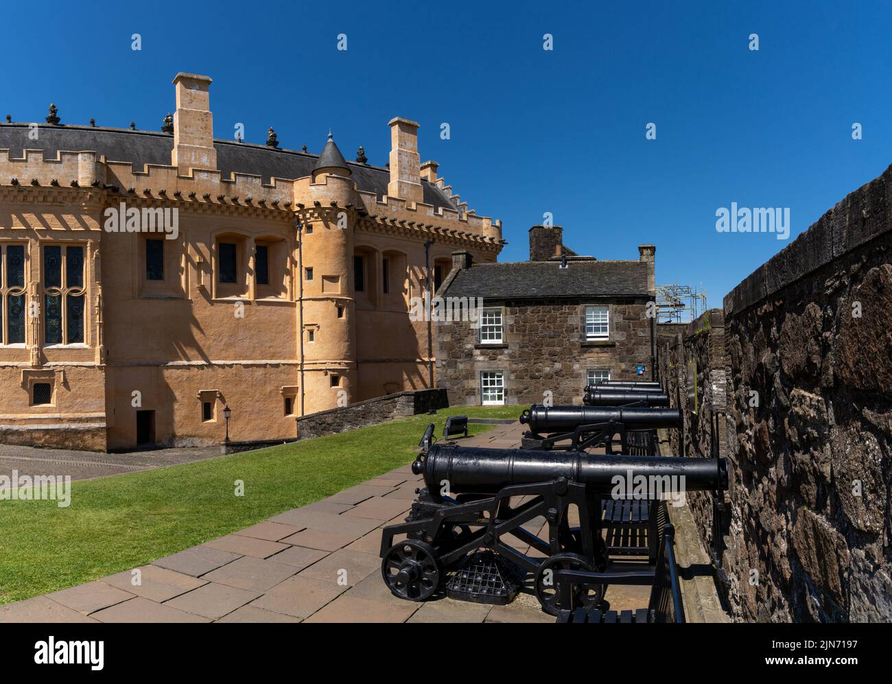 Stirling, United Kingdom - 20 June, 2022: view of the Stirling Castle courtyard with cannons on the battlements and the Great Hall in the background Stock Photo