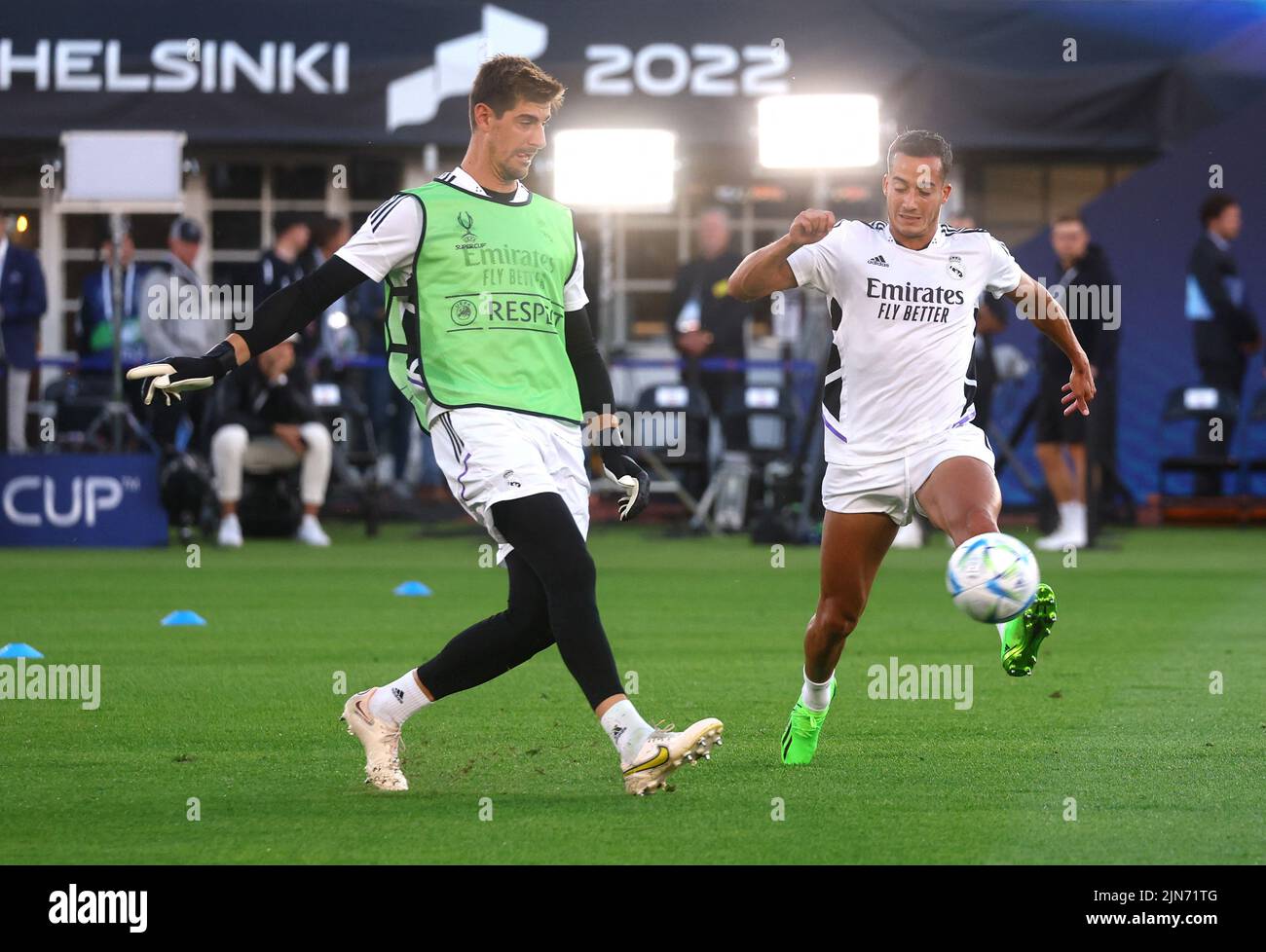 Soccer Football - European Super Cup - Real Madrid Training - Helsinki Olympic Stadium, Helsinki, Finland - August 9, 2022 Real Madrid's Thibaut Courtois and Lucas Vazquez during training REUTERS/Kai Pfaffenbach Stock Photo