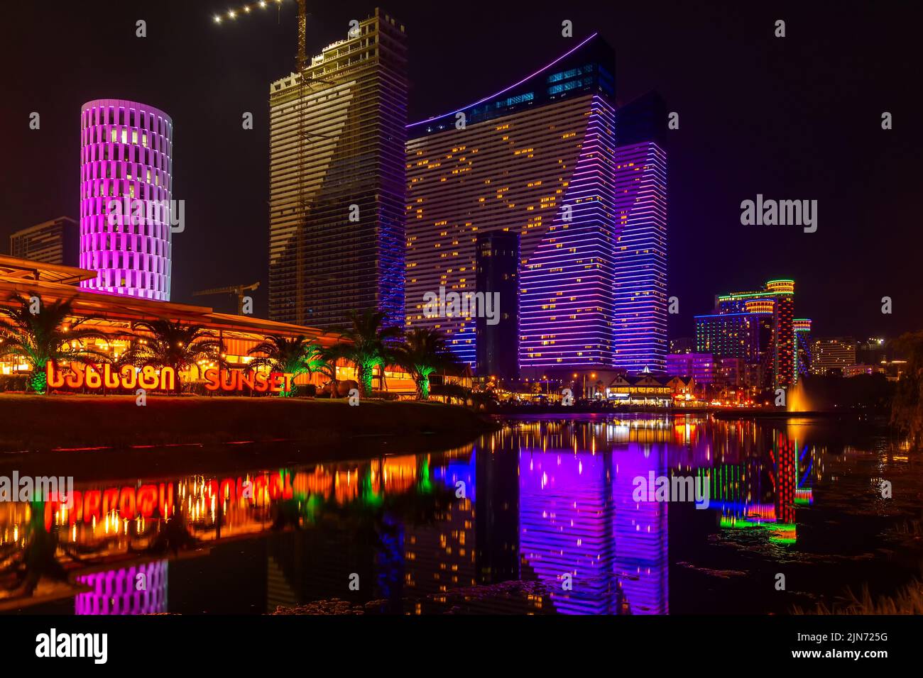 Batumi, Georgia. 1 July 2022: Night illumination on skyscrapers Stock Photo