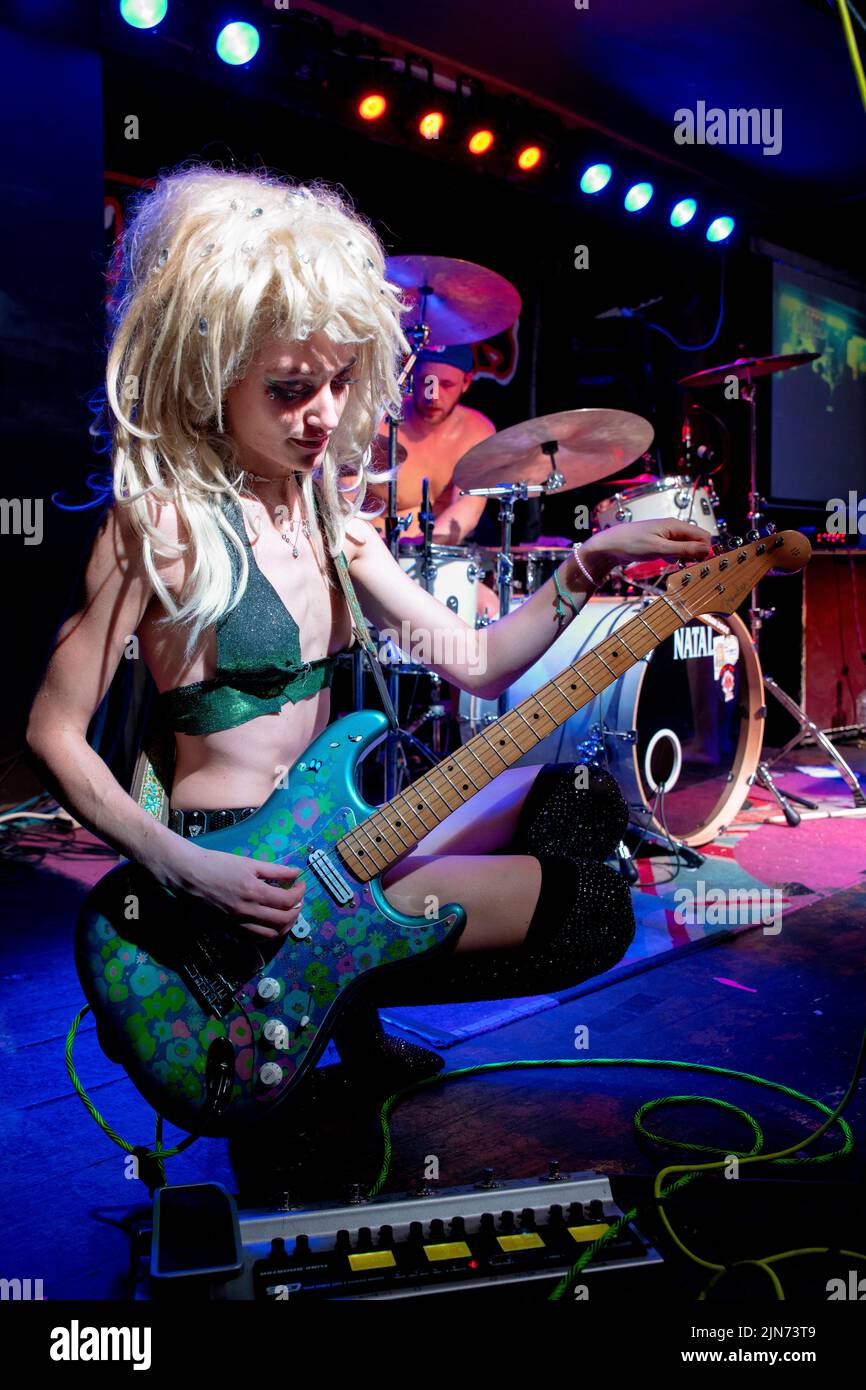 The Soapgirls Noemie Debray tuning guitar Stock Photo