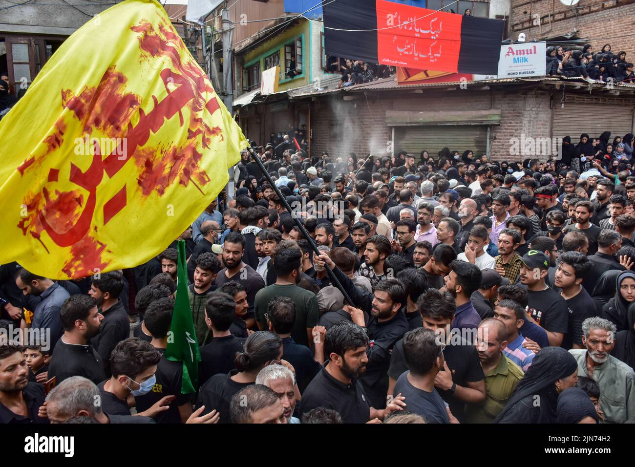 Kashmiri Shiite Muslims take part in a mourning ritual to mark Ashura ...