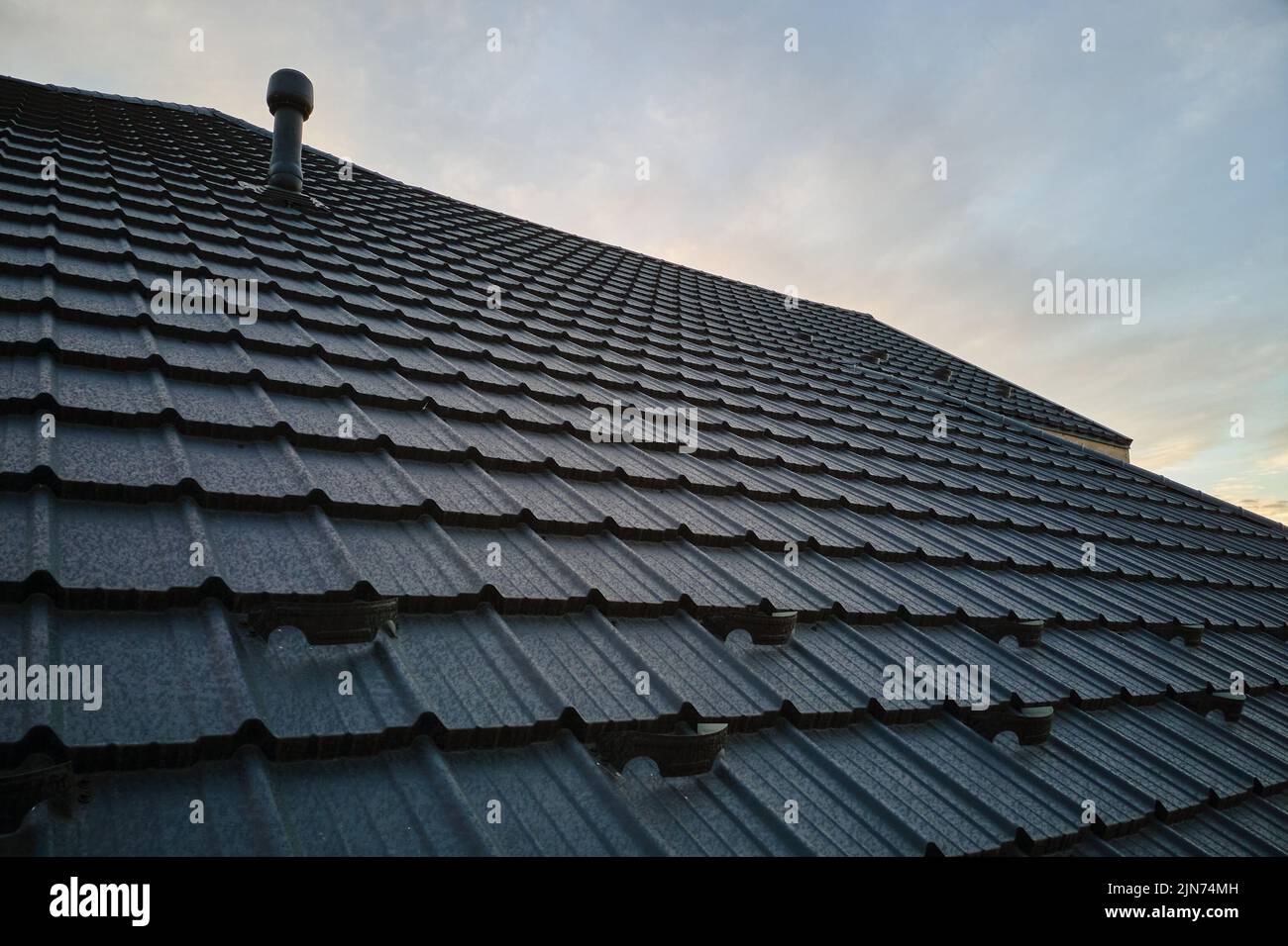 Snow guard for safety in winter on house roof top covered with steel