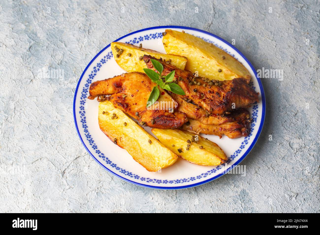 Turkish food; Baked chicken and potatoes (Turkish name; firinda tavuk