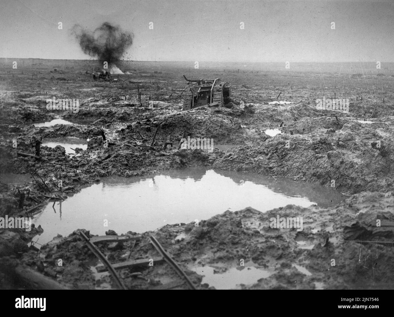 WESTERN FRONT, FRANCE - circa 1917 - No man's land...A destroyed British Army tank in no man's land on the Western Front during World War I. In the ba Stock Photo