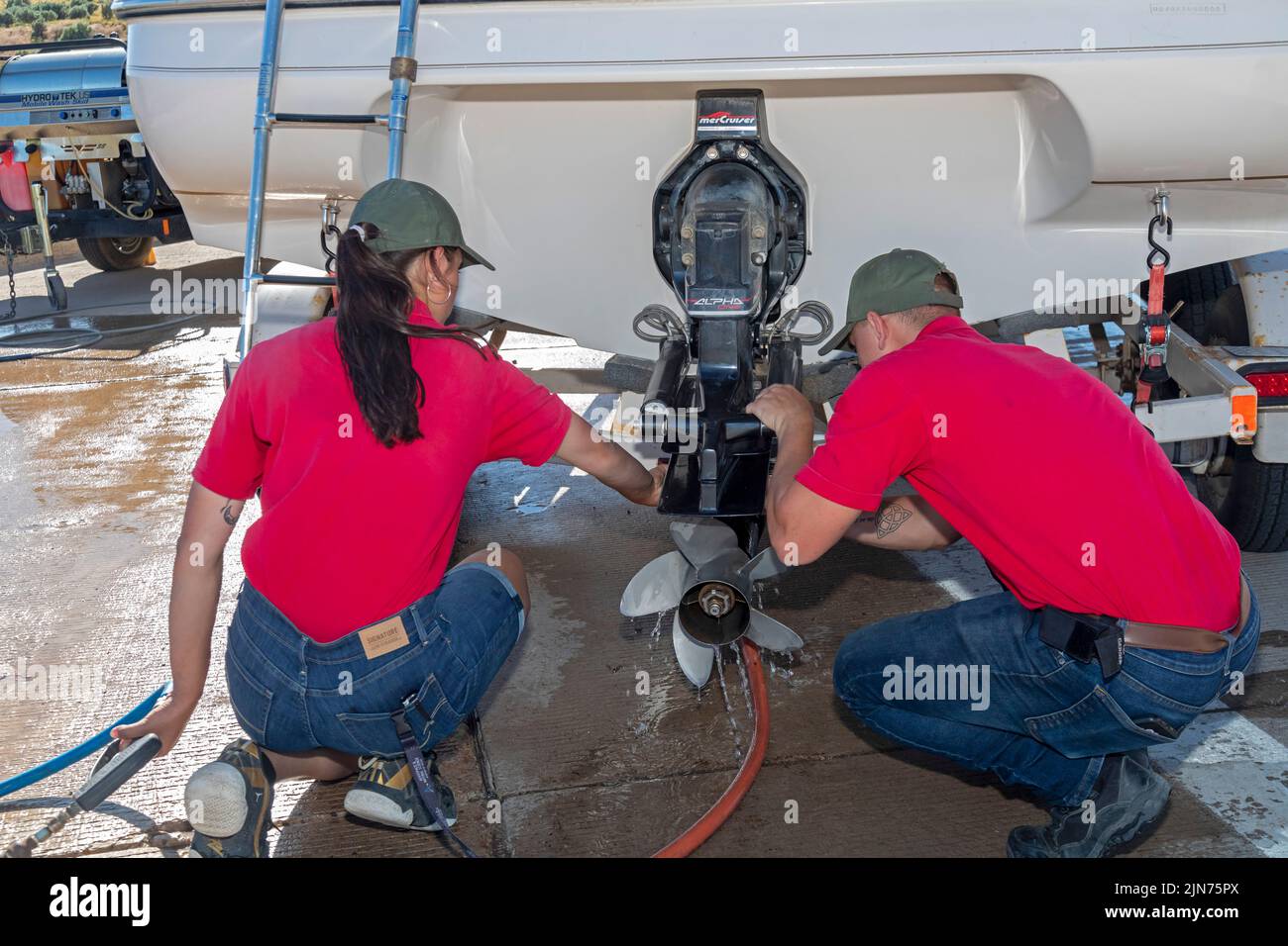 Evanston, Wyoming - Employees of the Wyoming Game & Fish Department inspect and decontaminate watercraft at a mandatory inspection station along the U Stock Photo