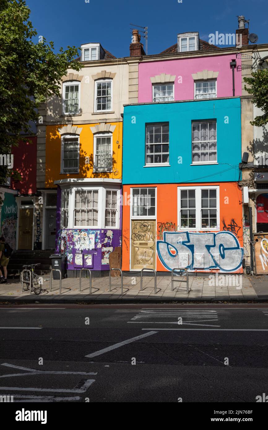 Bright colourful paint houses - Contemporary Street Art in Stokes Croft, Bristol, England, UK Stock Photo