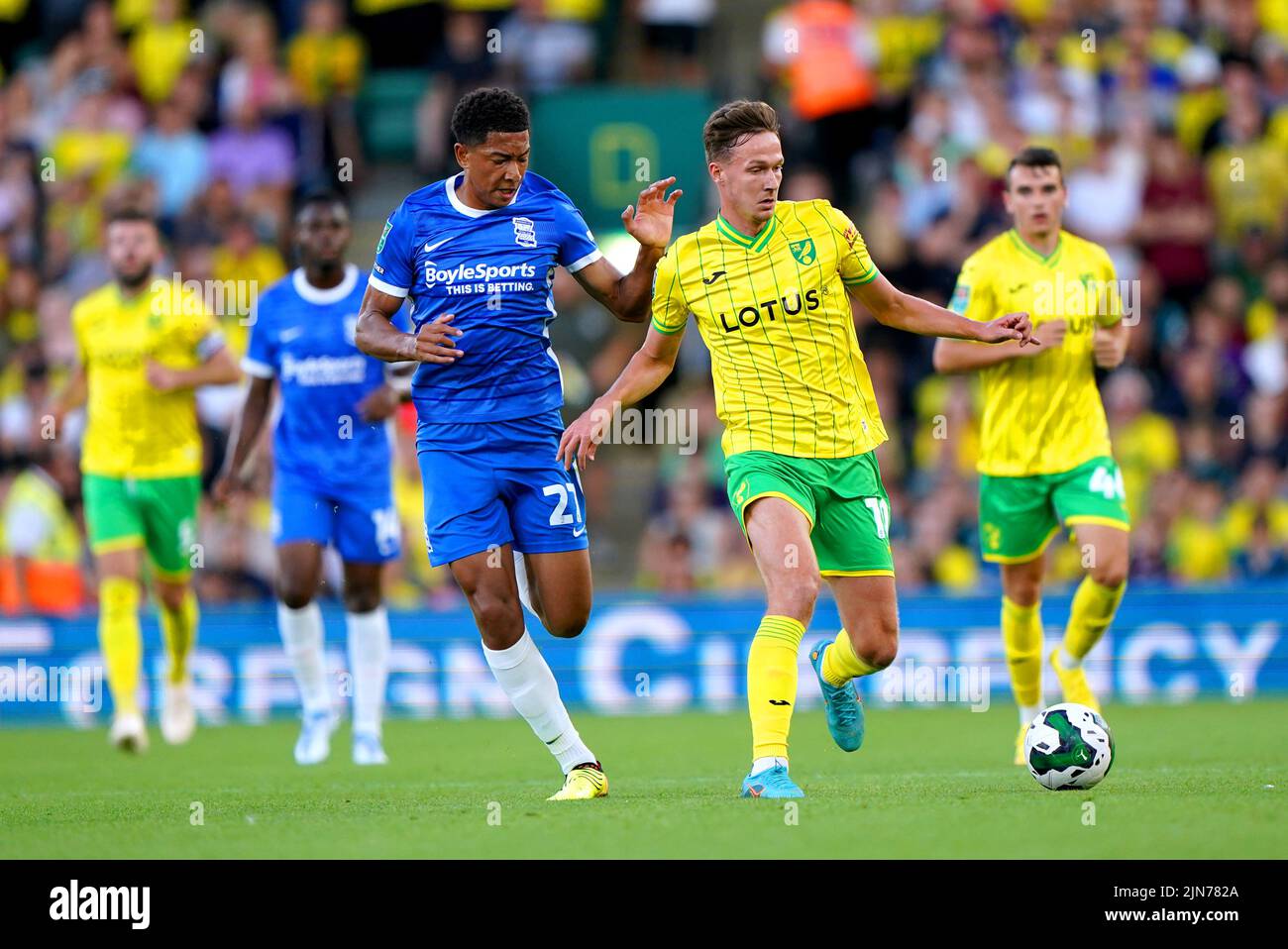 Birmingham City's Jobe Bellingham (left) and Norwich City's Kieran Dowell battle for the ball during the Carabao Cup, first round match at Carrow Road, Norwich. Picture date: Tuesday August 9, 2022. Stock Photo